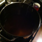 Heating some cider for the honey